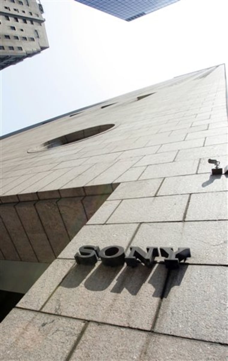 Ten people were hospitalized after ice and glass broke through a glass atrium at the Sony Building.